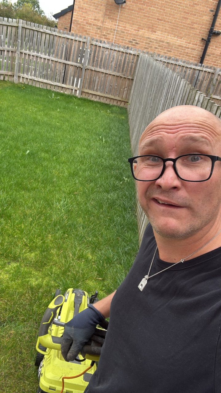 Phil out on a job in a freshly mown back garden.