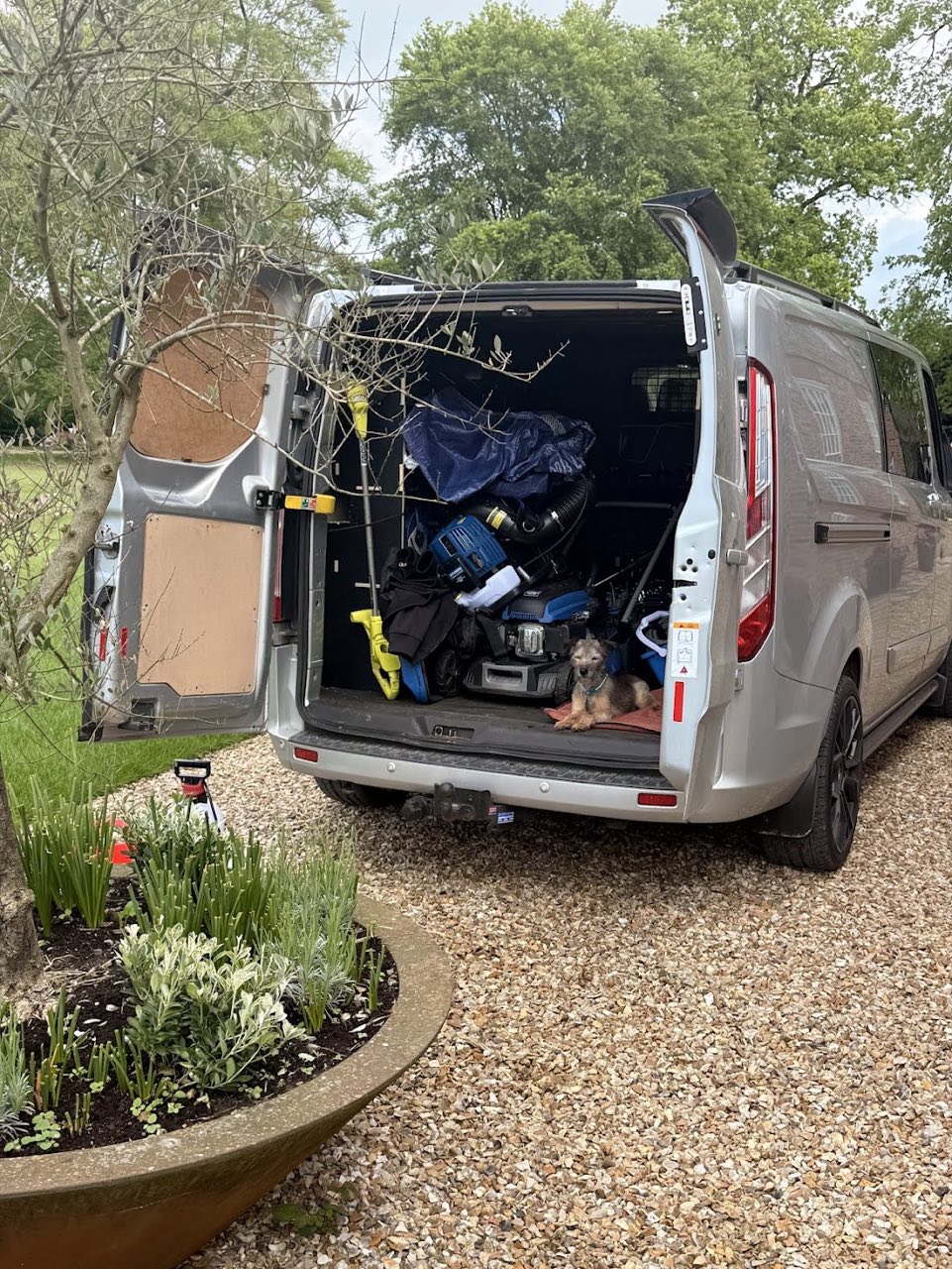 Phil's work van loaded with tools and equipment, ready for a job.